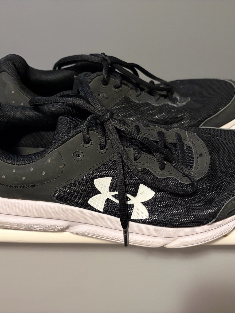 Under Armour Unisex Black Athletic Sneakers with White Logo